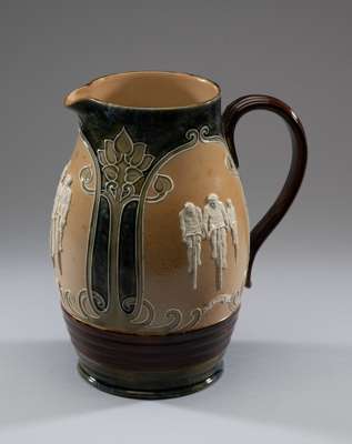 Doulton Lambeth pottery cycling jug early 20th century,
 in Art Nouveau style with three relief vignettes of cyclists titled 'Military'; 'Road'; 'Path
