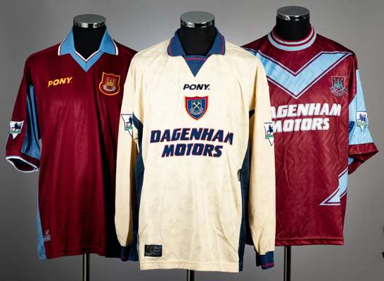 A group of three West Ham United Premier League jerseys,
 comprising Emmanuel Omoyinmi clart and blue no.27 home jersey; Keith Rowland no.23 home jers