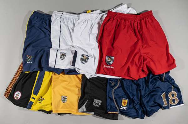 Collection of football shorts, comprising black Bradford City Bantams shorts