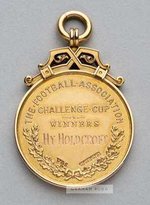 1938 F.A. Cup winner's medal awarded to George "Harry" Holdcroft the Preston North End goalkeeper,
  14ct. gold, the reverse inscribed HY. HOLDCROFT, 