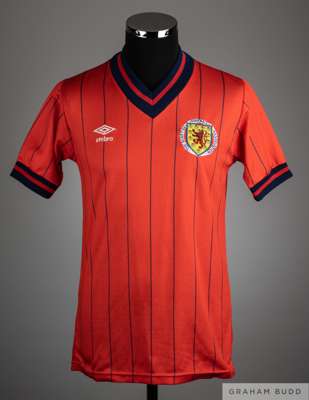 Charlie Nicholas red and blue No.18 Scotland v. Yugoslavia match worn short-sleeved shirt, 1984, 
 Umbro, Mens, with v-neck collar and embroidered bad