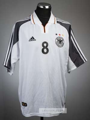 Dietmar Hamman white Germany No.8 home jersey, circa 2000,
 Adidas, short-sleeved with national emblem and Adidas logo, reverse numbered 8

 Provenanc