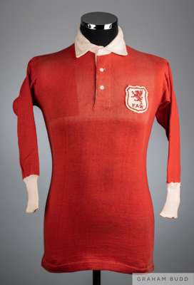 W.C. "Stoker" Peart red Wales Amateur international shirt, circa 1930s,
 by St Margaret, long-sleeved, button-up collar, F.A.W. cloth badge

 Area of 