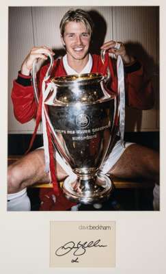 David Beckham Manchester United signed colour photograph display,
 the large 16 by 12in. imaged depicting Beckham holding the UEFA Champions League Tr