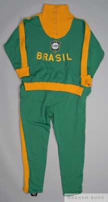 Pele yellow and green Brazil worn tracksuit, top and bottoms, mid-1960s, 
 Umbro, G, with zip-up collar and embroidered cloth badge inscribed CBD and 