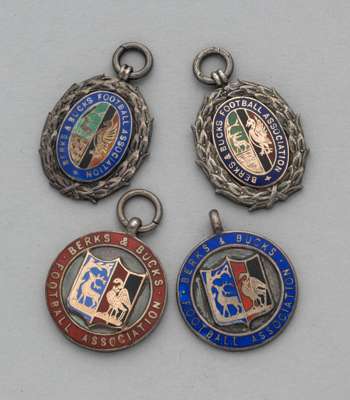 Four silver and enamel Berks & Bucks Football Association medals, 1920s/30s, 
 the obverse of each inscribed Berks & Bucks Football Association, the r