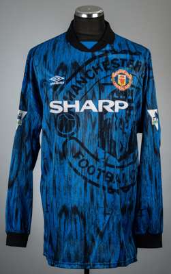 Steve Bruce blue and black Manchester United no.4 away jersey, season 1992-93,
 Umbro, long-sleeved with THE FA PREMIER LEAGUE sleeve badges, club cre