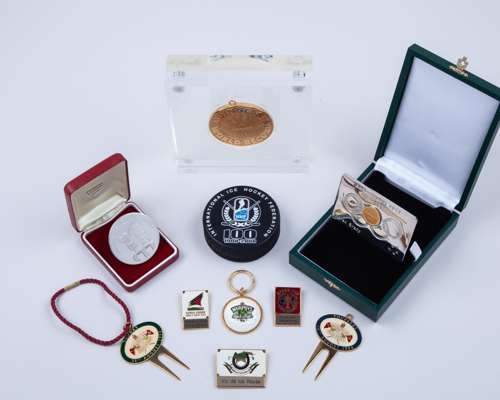 Three golf enamel lapel badges, two pitch repairers