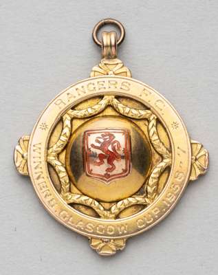 Rangers F.C. winner's medal Glasgow Cup 1936-37 awarded to trainer A Dixon,
 obverse with the Scottish lion rampant in red enamel and engraved RANGERS