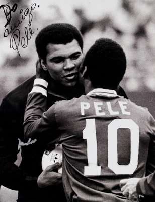 A Pele and Muhammad Ali double-signed photographic print, a 20 by 16in. b&w image of the two great 20th century legendary sportsmen meeting on the occ