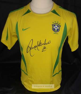 Brazil 2002 World Cup replica winning jersey signed by the enigmatic Ronaldinho boldly across front of jersey,
 in black sharpie, considered one of th