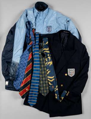 An official England blazer, 
 with embroidered three lion badge by Daks, no size, Umbro England coat and five various ties, (7)
