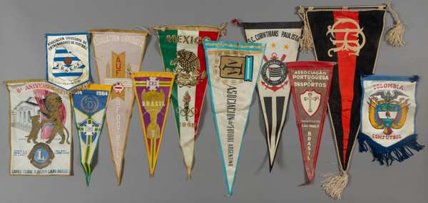 A group of eleven South American international football pennants originally owned by Sir Alf Ramsey,
 Brazil (2), Uruguay (2), Argentina, Colombia, Me