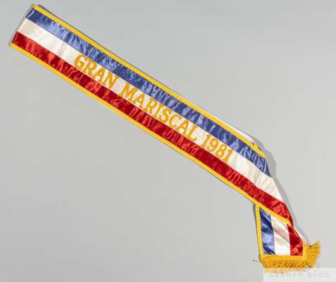 Ex-Pelé Collection: red, white, and purple sash embroidered with the text "Gran Mariscal, 1981" 

Grand Marshal sash as issued to Pelé to be worn as a
