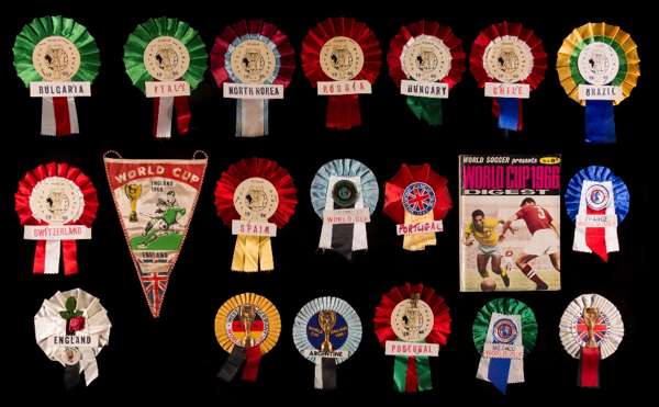 A collection of 17 1966 World Cup rosettes, comprising Argentina, Brazil, Bulgaria, Chile, England (two), France, Hungary, Italy, Mexico, North Korea,