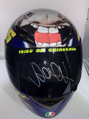 Valentino Rossi (Italy) signed “Donkey” AGV-K3 MotoGP replica helmet (Misano 2009),
 signed on Visor, excellent autograph. Rossi officially retired fr