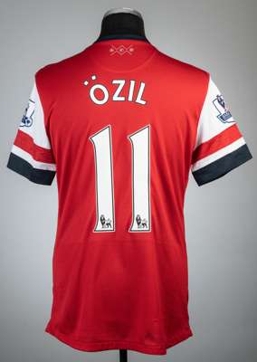 Mesut Ozil red Arsenal no.11 jersey v Stoke City, commemorating 100 years of Arsenal in Islington, played at Emirates Stadium, 22nd September 2013,
 N