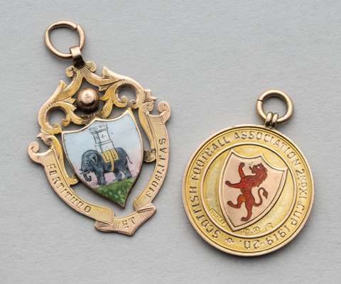 Two Scottish football medals, 
 the first for the Scottish FA 2nd XI Cup in 1919-20, won by WD Davidson of Queens Park Strollers; the other in 9ct gol
