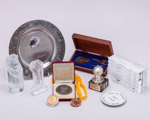 A Collection of Commemorative Plates, Trophies & Medals Presented to Nigel Mansell