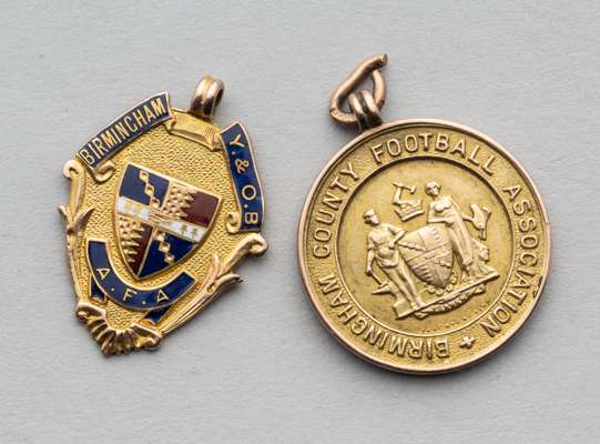 Two 9ct gold Birmingham football medals awarded to W Pickering, 
 the first for Birmingham County Football Association Junior Cup Winners 1924-25, obv