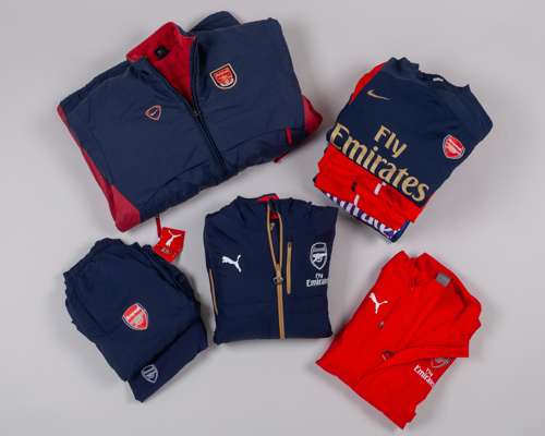 Twelve Arsenal tracksuit tops and jackets