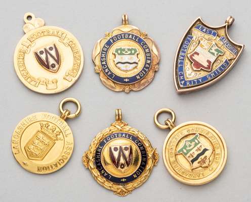 Six Lancashire football medals awarded to Darwen F.C.'s P.H. Quigley,
 comprising Last Lancashire Football Charity Shield winner's medal 1923-4, obver