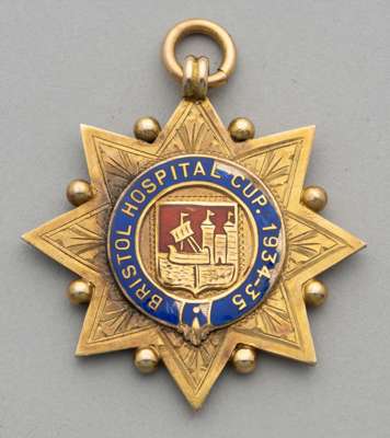 Bristol Rovers 9ct gold medal for Bristol Hospitals Cup 1934-35 awarded to W Pickering, 
 impressive star shaped medal, obverse with crest, enamelled 