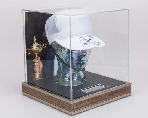 Seve Ballesteros and Padraig Harrington autographed white cap display