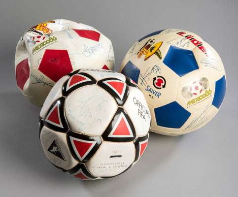 A trio of autographed footballs from the 1986 World Cup including the winners Argentina, hosts Mexico and the Brazilian team, each ball fully-signed b