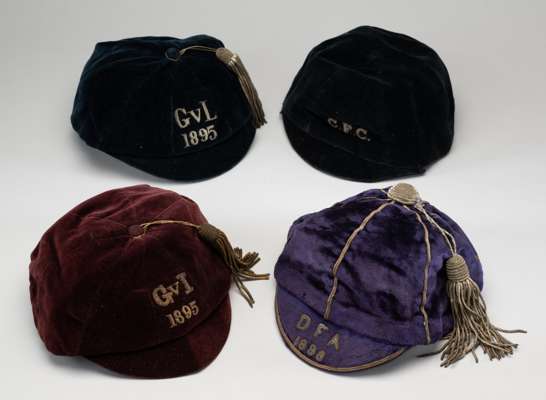 Two Glasgow representative caps, 1895, 
 both with tassels, one embroidered G V L 1895, the other G V I 1895, a purple velvet cap, with silver tassel,
