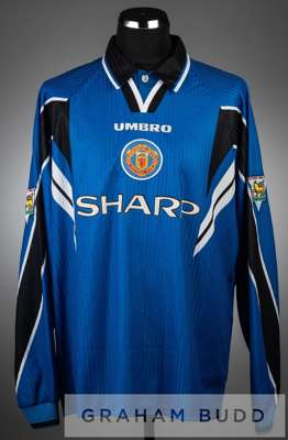 Gary Pallister blue and white Manchester United no.6 third choice jersey, season 1997-98,
 long-sleeved with THE FA PREMIER LEAGUE CHAMPIONS 1996-1997