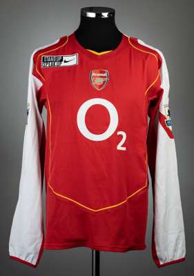 Robert Pires red and white Arsenal no.7 jersey from the infamous Keane v Vieira tunnel incident match v Manchester United, played at Highbury, 1st Feb