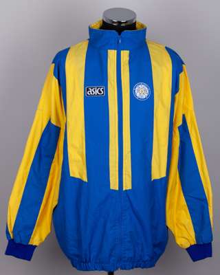 A blue and yellow Leeds United tracksuit top