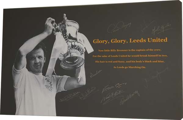 Leeds United1972 FA Cup Winners signed canvas featuring an image of Billy Bremner holding the FA Cup along with a paragraph from a Leeds Chant in gold