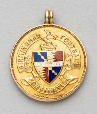 Birmingham Football Combination winner's medal awarded to Wolverhampton Wanderer's H. Belcher, 1934-35,
 obverse with enamelled shield surrounded by B