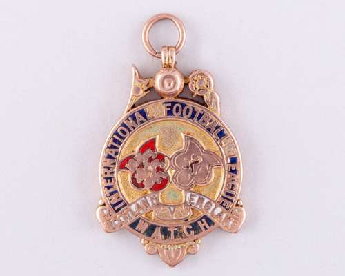A 9ct gold and enamel Scotland v. England International medal