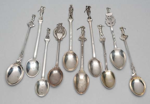 Ten various silver hallmarked golf prize spoons, dating from 1912 (all pre-WWII),
 all with golfing figure finials and several with golf club initials