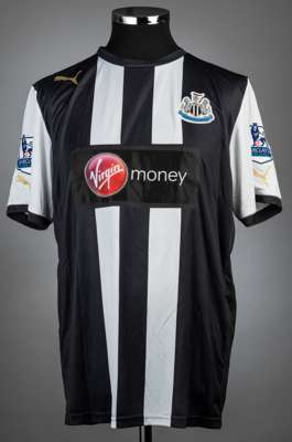 Demba Ba black & white striped Newcastle United no.19 jersey v Manchester City, played at St James' Park, 6th May 2012,
 match-issue, Puma, short-slee