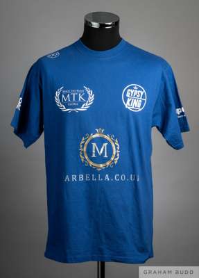 Two Tyson Fury worn t-shirts, 
 comprising blue Russell short-sleeved bearing GYPSY KING, BXF, MACK THE KNIFE GLOBAL, MARBELLA.CO.UK, IMPACT INSURANCE