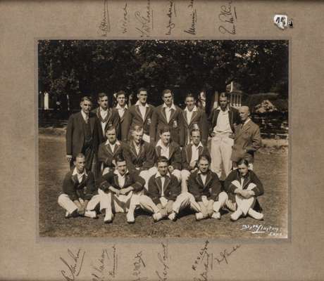 England M.C.C. cricket tour to South Africa b & w signed team photograph 1930-31,
 featuring the England team in standing and seated pose wearing tour