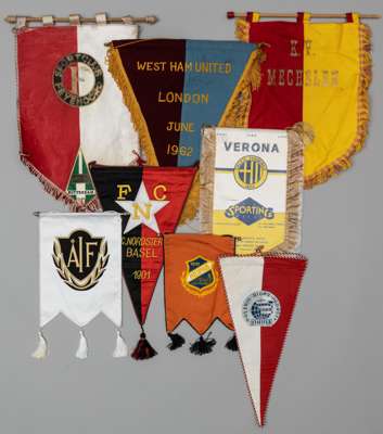 Eight European Football Club Pennants from the 60s and 70s,
 including a nice West Ham United example in claret and blue with gold trimming and bearin
