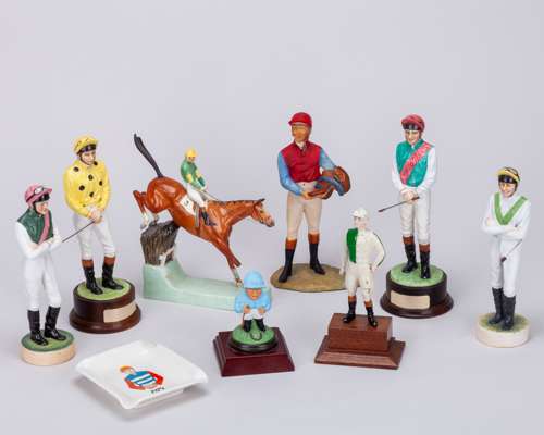 A group of Jockey figurines