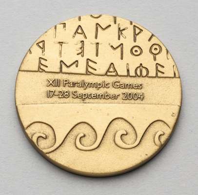 Athens 2004 Paralympic Games Bronze medal,
 obverse inscription "XII Paralympic Games / 17-28 September 2004" at centre, ancient greek letters above a