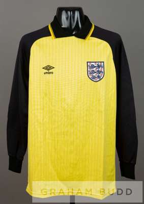 Peter Shilton yellow and black England no.1 goalkeeper's jersey, season 1984-1986,
 by Umbro, match worn long-sleeved with England three lion emblem a