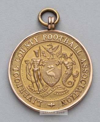 1931-32 Liverpool County F.A. Challenge Cup winner's medal awarded to the Everton goalkeeper George "Harry" Holdcroft
 9ct. gold, Usher Manufacturing 