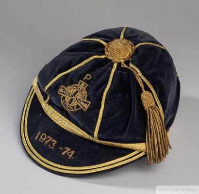 Blue Northern Ireland v. Portugal International cap, 1973-74
 the blue velvet cap with gilt tassel and gilt braiding, embroidered with the Irish Footb