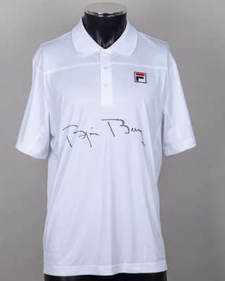 A white Fila tennis shirt autographed by Bjorn Borg, UK XL, with button-up collar