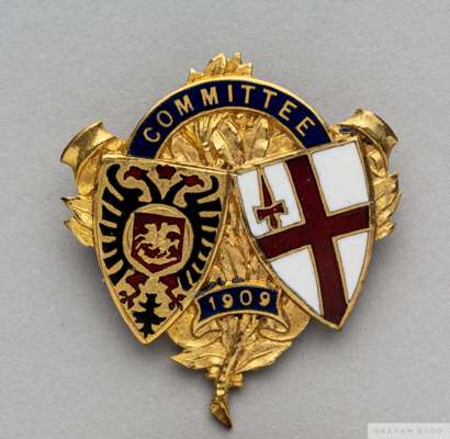 Yellow-metal and enamel London Football Association committee badge, 1909
 the obverse inscribed COMMITTEE, 1909 by Skinner & Co with brooch attachmen