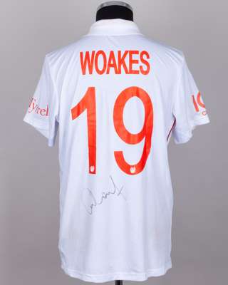 Chris Woakes white and red No.19 England v. India match worn, autographed Red For Ruth shirt