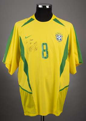 Kaka signed yellow & green Brazil No.8 international jersey circa 2002,
 Nike, short-sleeved, signed in fine black marker, the reverse lettered KAKA; 